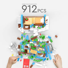 Load image into Gallery viewer, Winter Christmas Cottage Building Toy, a Christmas House Home Decor with a Yard Covered by Snow