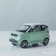 Load and play video in Gallery viewer, 1/20 Scale MINIEV-like Electric Car Replica - Pull-Back Opening Doors, Alloy Model with Realistic Wheels - Birthday/Collection Gift for Kids, Adults, Collectors, Home Decor, Detailed Design, Durable Construction, Adult Collectibles
